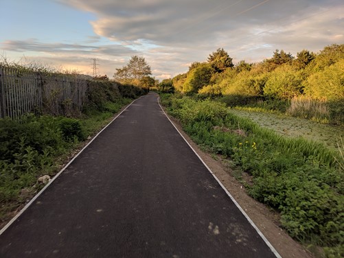 After work was completed, the overgrowth had been cut back. The path itself has been resurfaced with smooth tarmac.