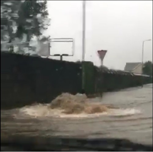 Figure 11 - Picture showing surcharging water from Ynysydarren culvert (ref 2016 Report)